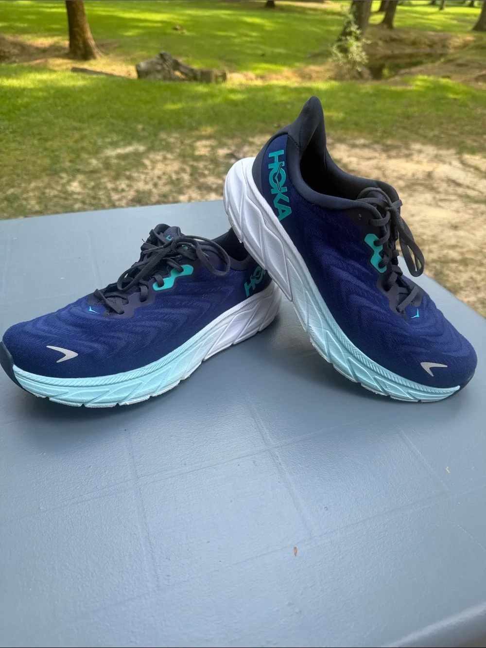 Hoka Navy Running Shoes with Aqua Accents. Wide shoes